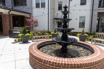 The Legacy at Walton Kennesaw Mountain beautiful courtyard with gas grills fountain